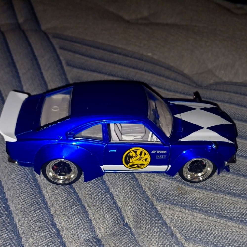 Jada Toys 1:24 scale diecast 1974 Mazda RX-3